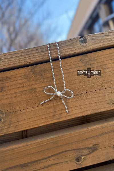 Blessed Bow Necklace by Rowdy Crowd Clothing with silver pearl bow pendant – Cowtown Bling N Things Fort Worth