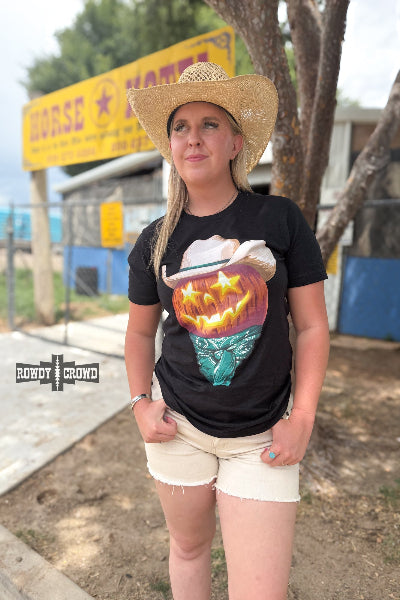 Woman looking afar wearing Western Halloween tee with jack-o'-lantern in cowboy hat – Rowdy Crowd Clothing