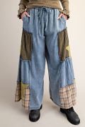 Mineral washed denim pants with plaid flannel patch detail