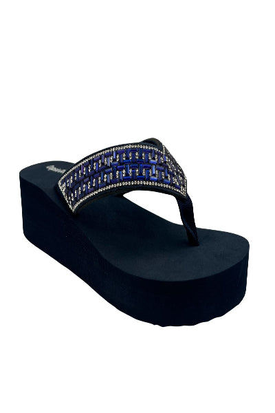 Black sandal with blue and silver embellishments on a white background