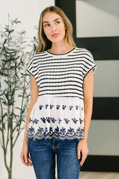 Model wearing Too Sweet to Share top with textured knit bodice and scalloped hem